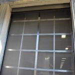 Outside view of dock door bug screen - dock door protection in Dallas TX