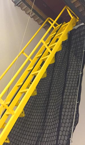 Installed debris safety netting satisfies OSHA’s 5,000-pound load requirement. The safety netting anchor system can suspend a full-size pickup