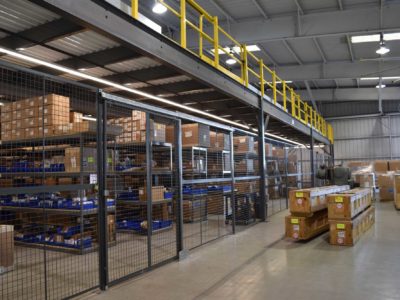 Mezzanine Integration with Lighting, Secured Partitions, and Shelving