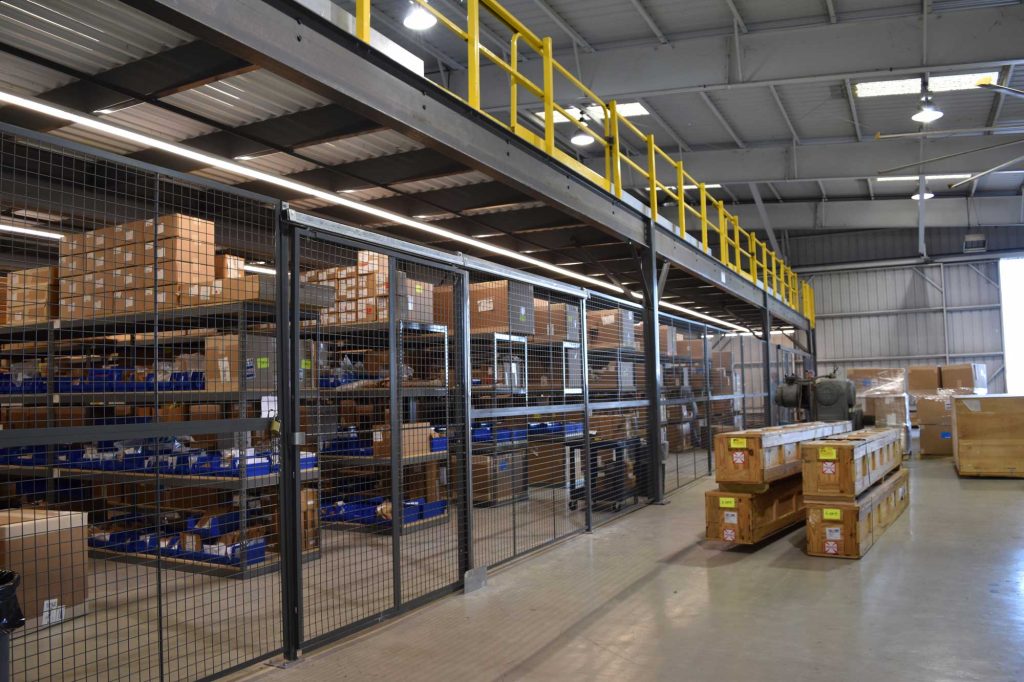 Mezzanine Integration with Lighting Secured Partitions Shelving