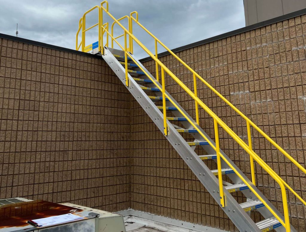 rooftop-stair-over-large-wall